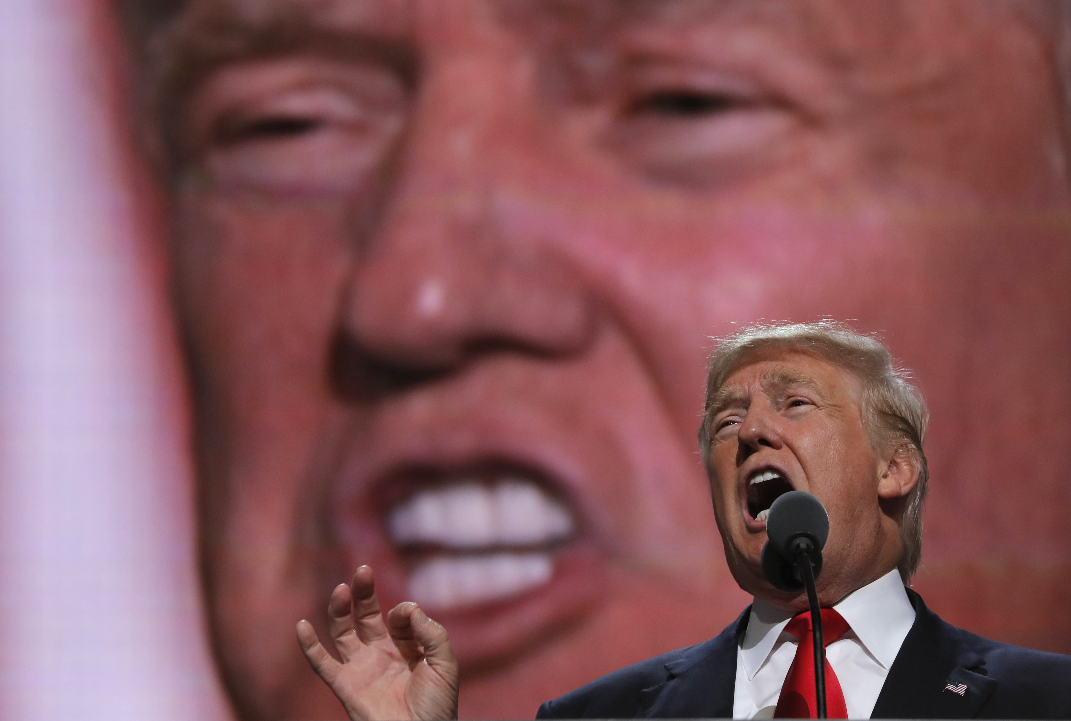 Republican U.S. presidential nominee Donald Trump speaks as he accepts the nomination during the final session of the Republican National Convention in Cleveland, Ohio, U.S. July 21, 2016. REUTERS/Brian Snyder - RTSJ4LA